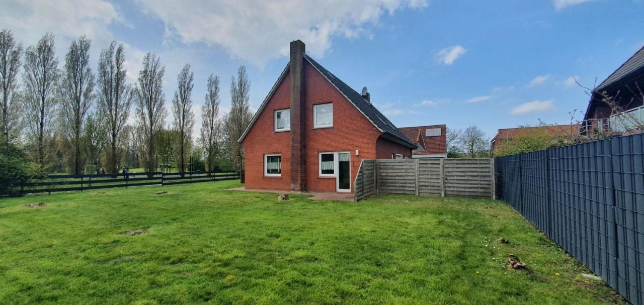 Ferienhaus Am Wellenpark Norddeich Exterior photo